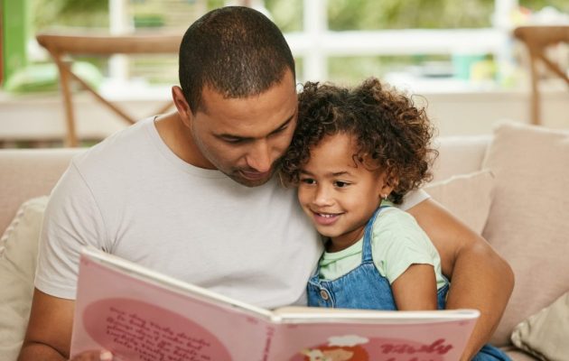 Father,,Girl,Child,And,Reading,Book,In,Home,For,Family Father,,Girl,Child,And,Reading,Book,In,Home,For,Family